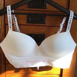 Victoria’s Secret medium white no underwire bra.